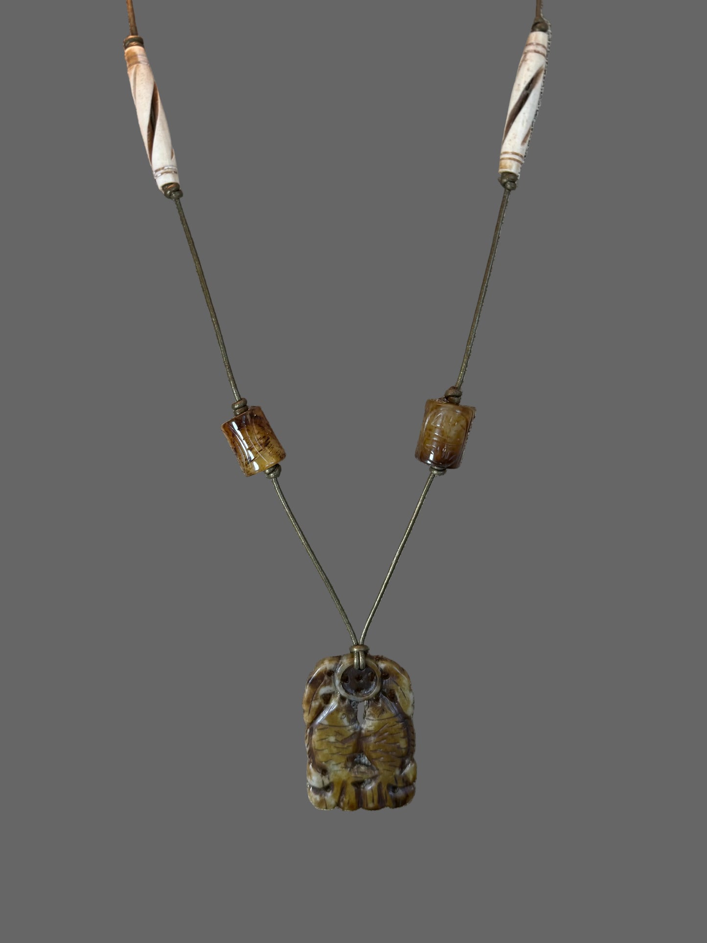 Double Fish Pendant on Leather
