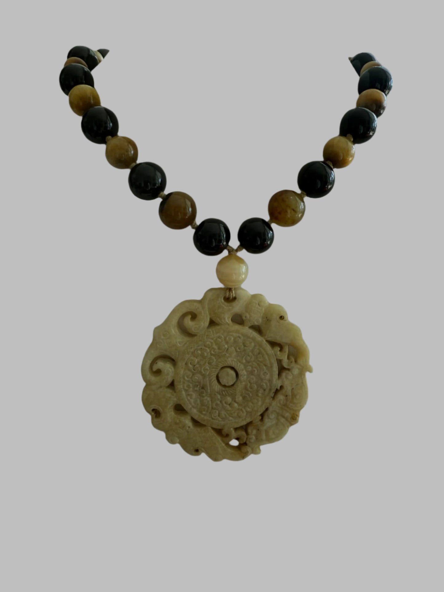 CARVED  TAN JADE PENDANT
