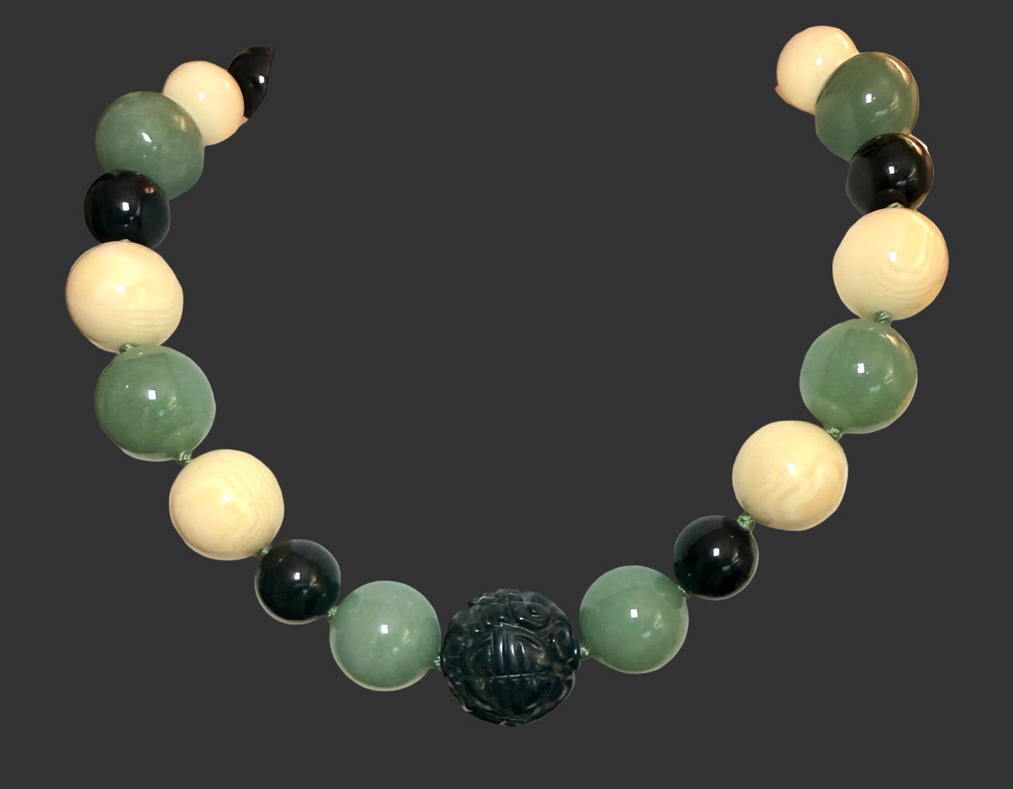 Carved Obsideon, Jade, Reconstituted Amber
