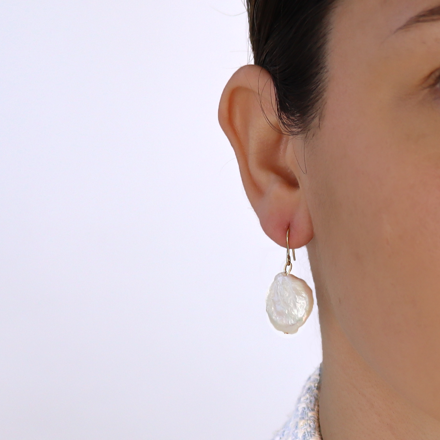 Large flat pearl dangle earring
