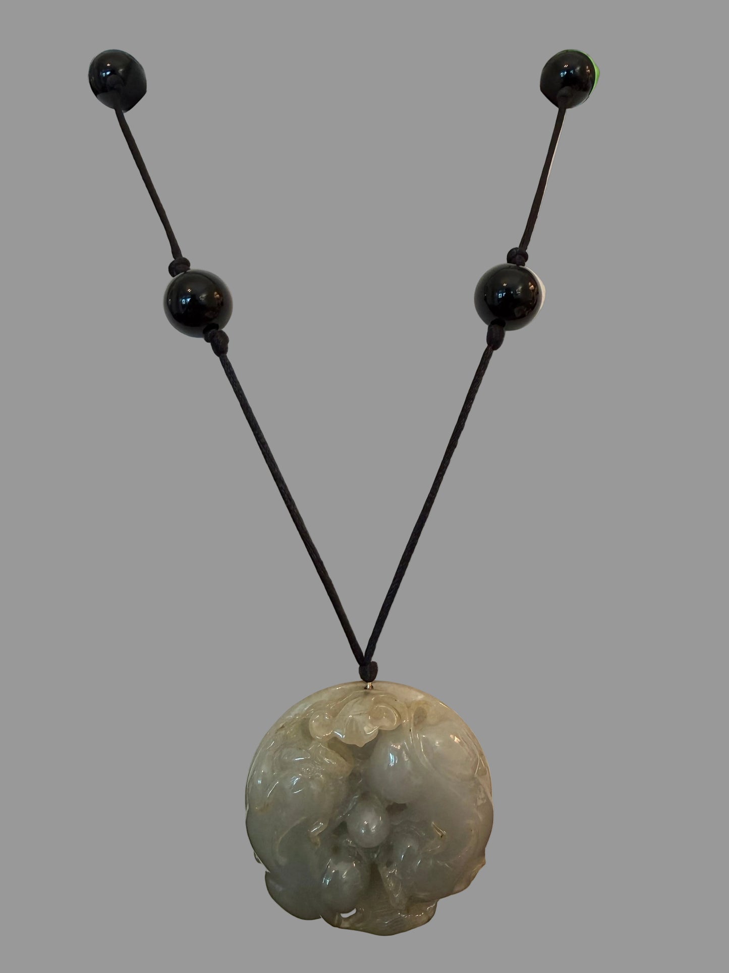 Jade Pendant on Black Silk