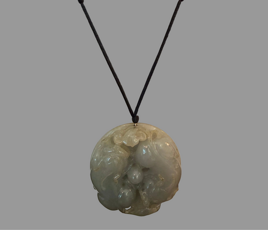 Jade Pendant on Black Silk