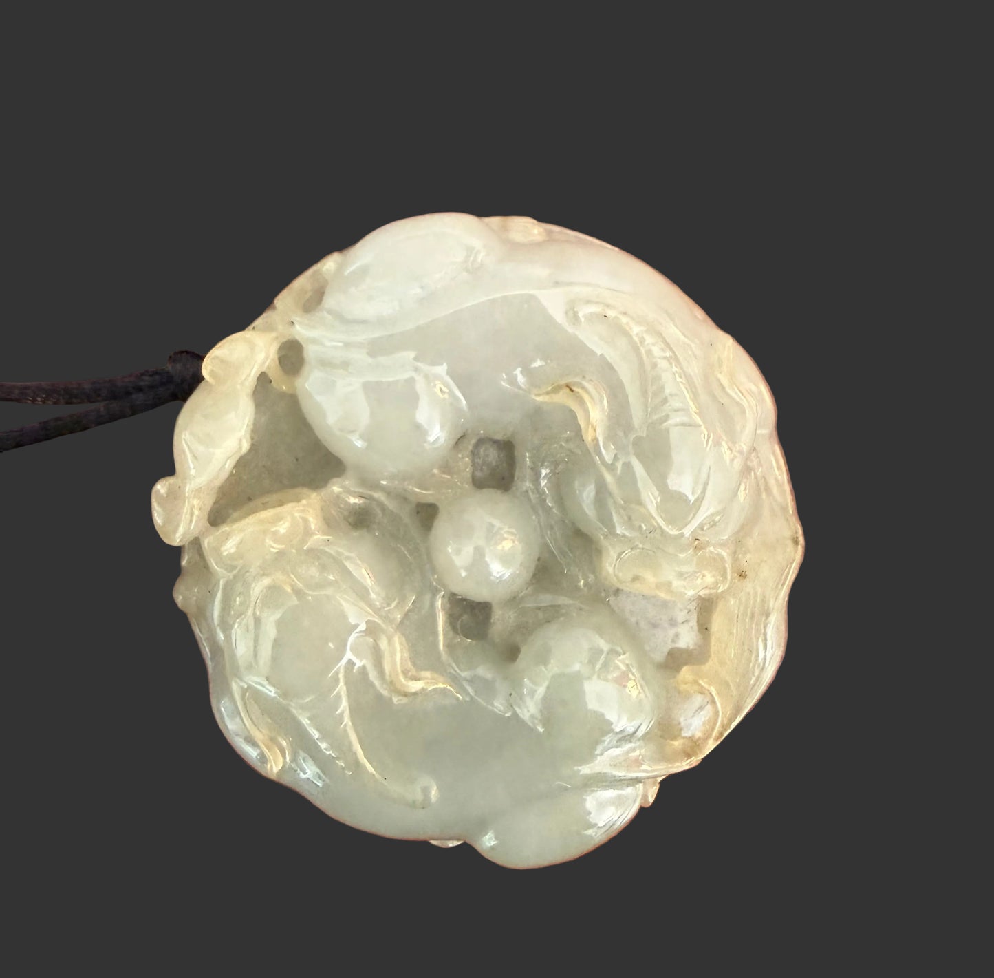 Jade Pendant on Black Silk