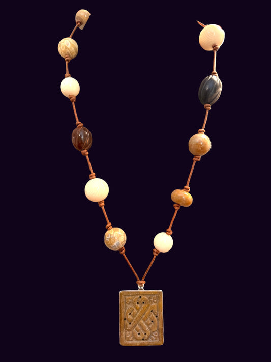 Cocoa Jade in Sterling with Fossils