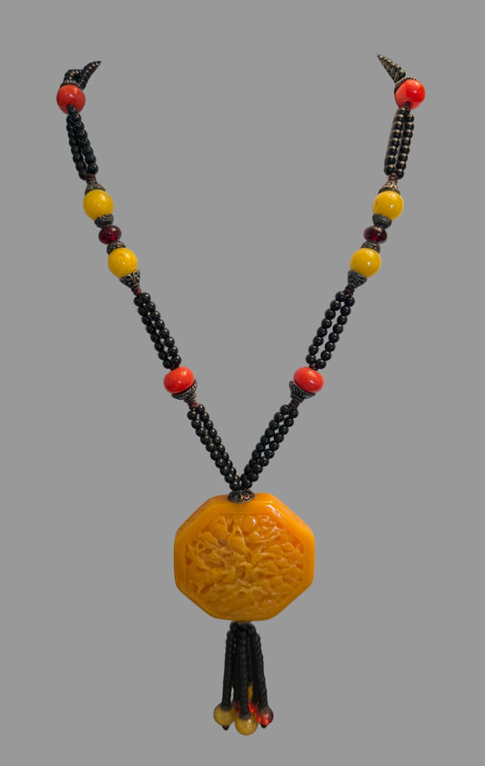 Necklace with Amber Color Pendant