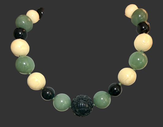 Carved Obsideon, Jade, Reconstituted Amber